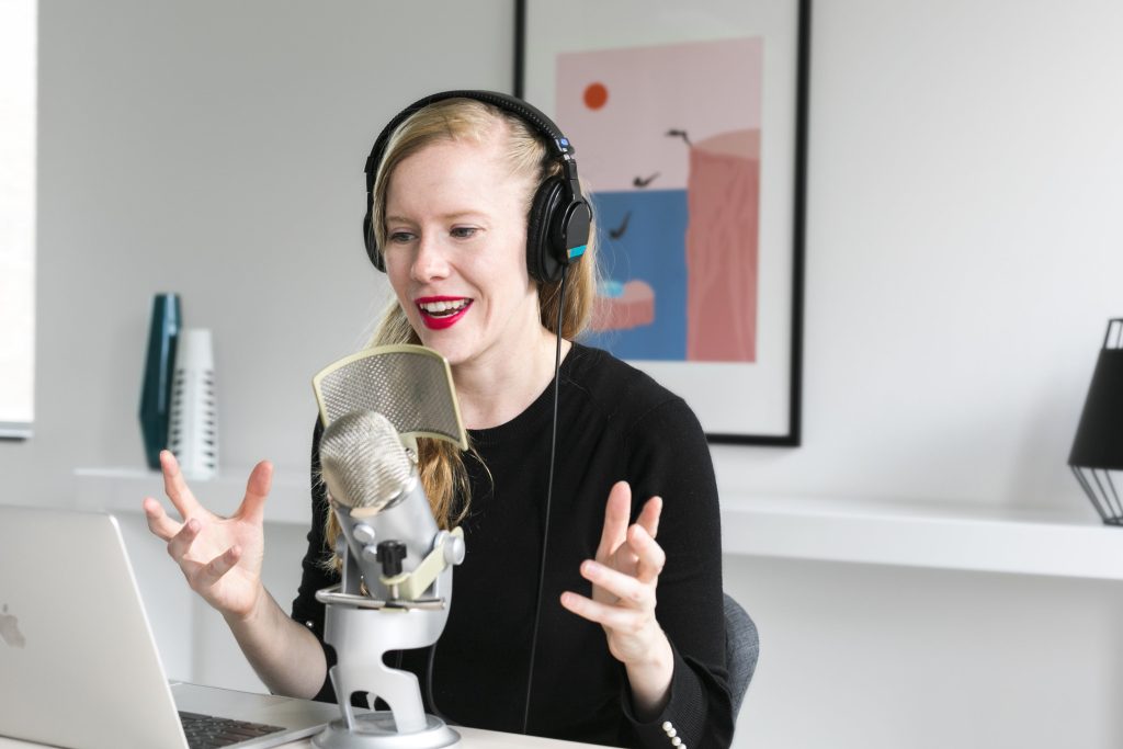 woman-recording-podcast-at-mic